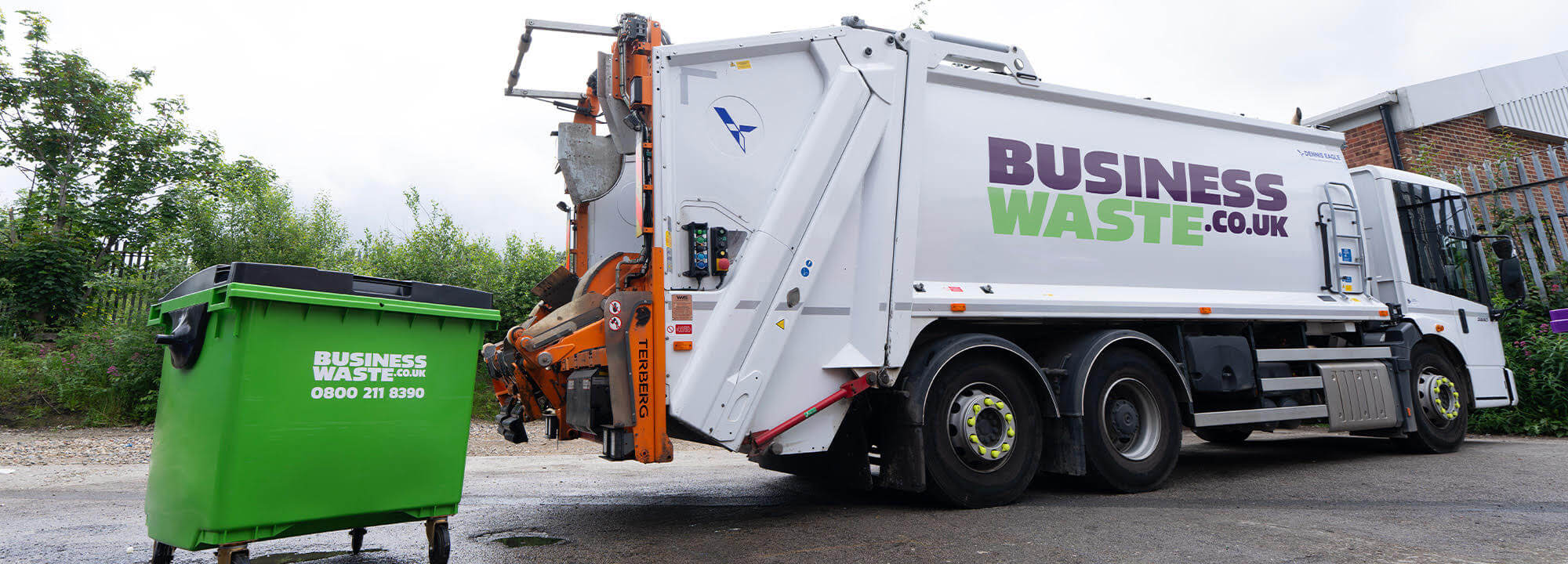 Business Waste LTD branded commercial bin and waste truck