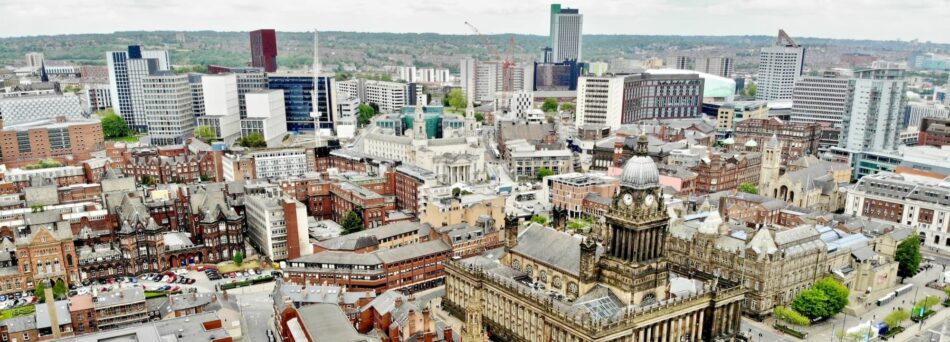 Overhead view of Leeds city centre and town hall.