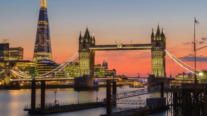 the Shard and Tower Bridge at sunset in London.