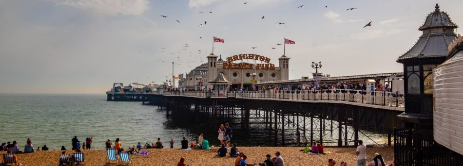 Brighton Pier and beach on a sunny day.