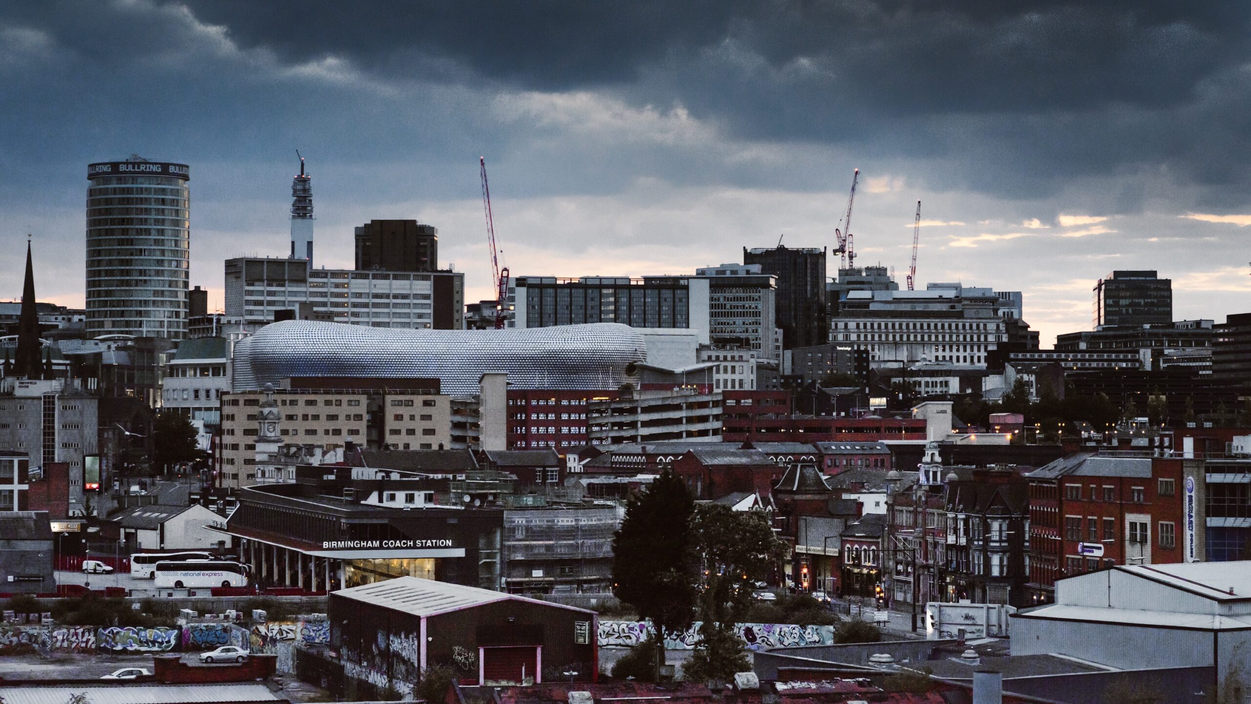 Birmingham city skyline on cloudy day.