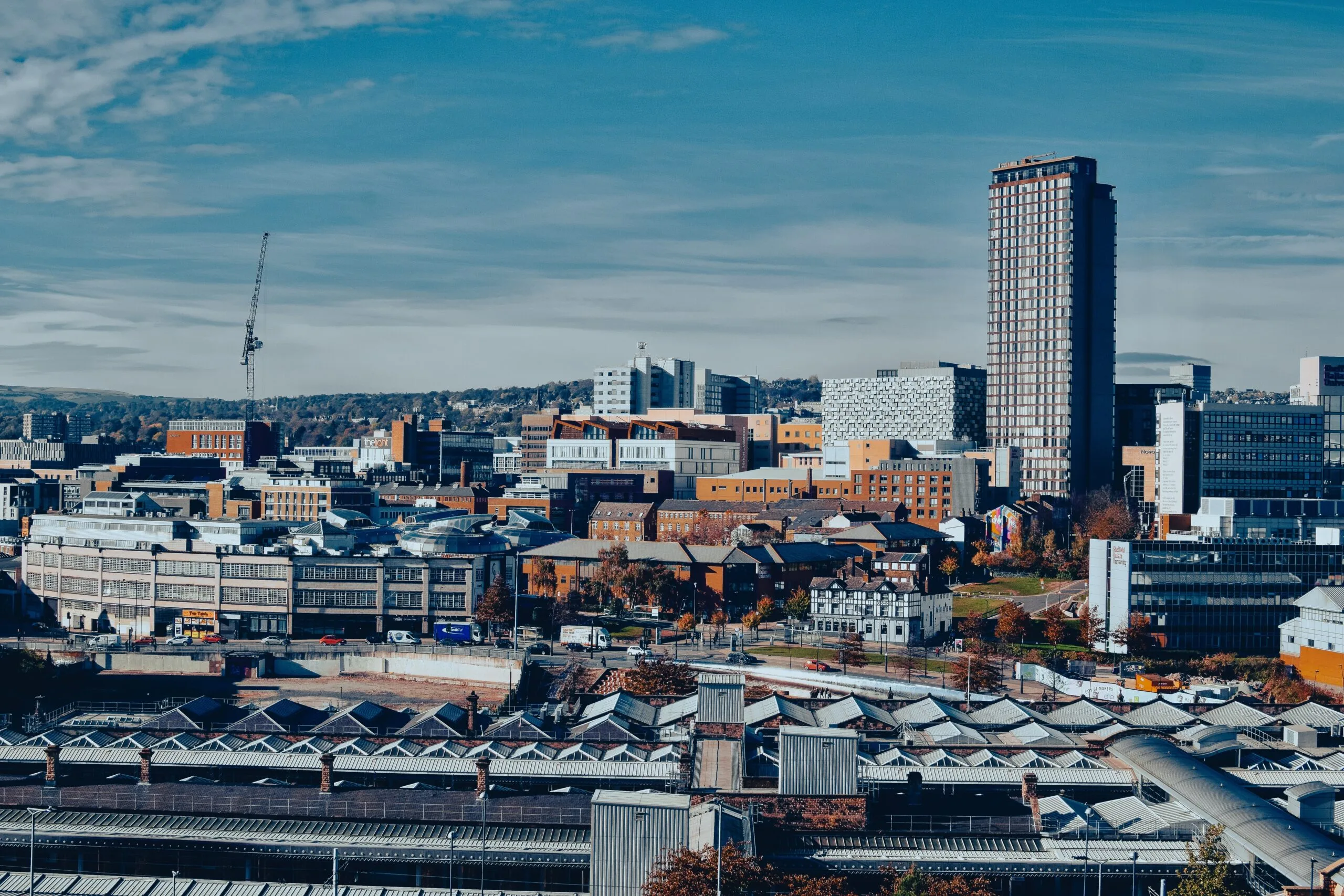 Sheffield skyline with train station in foreground.