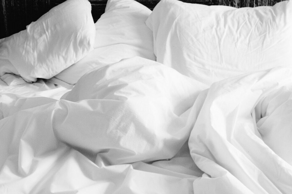 white pillows and sheets.