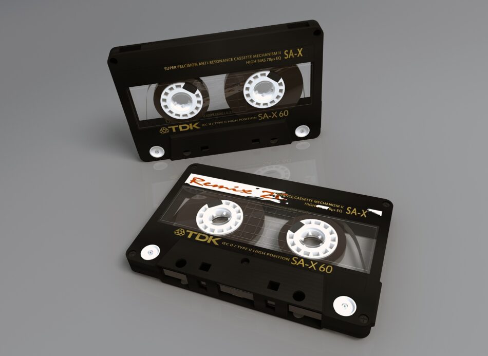 two black plastic cassette tapes.