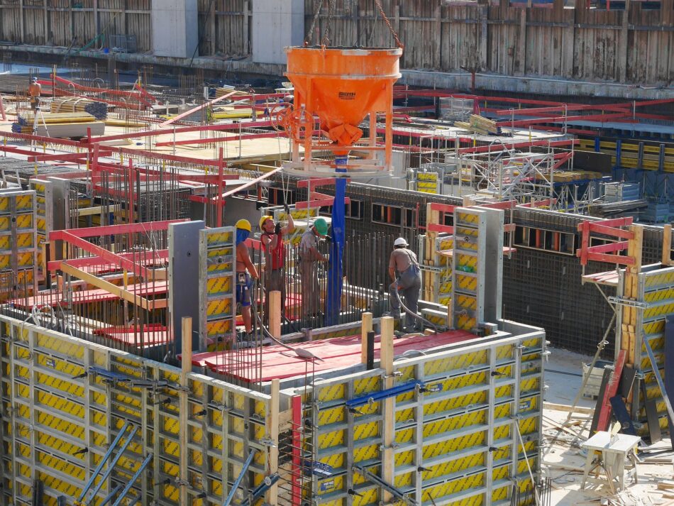 men working on construction site.