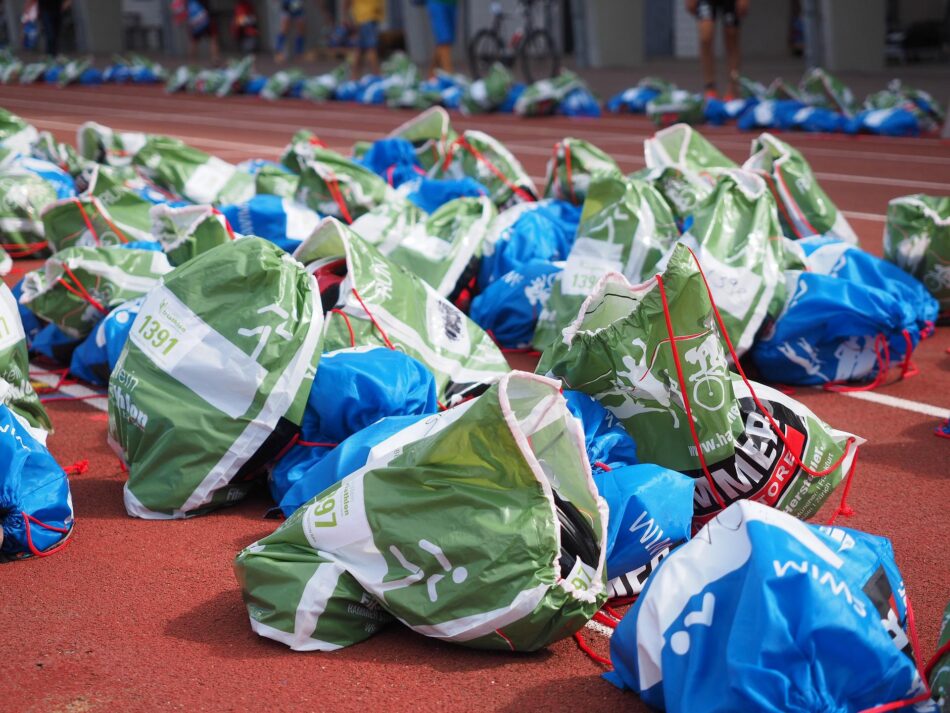 sports carrier bags on track.