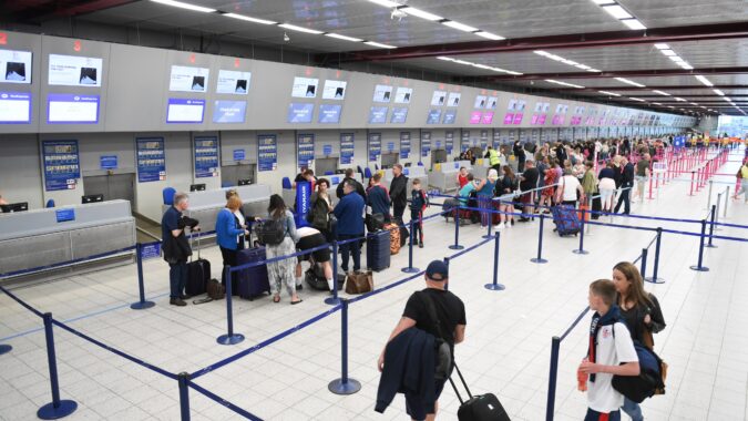 airport check in desks and queue.