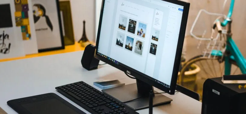 computer monitor with keyboard and mouse.