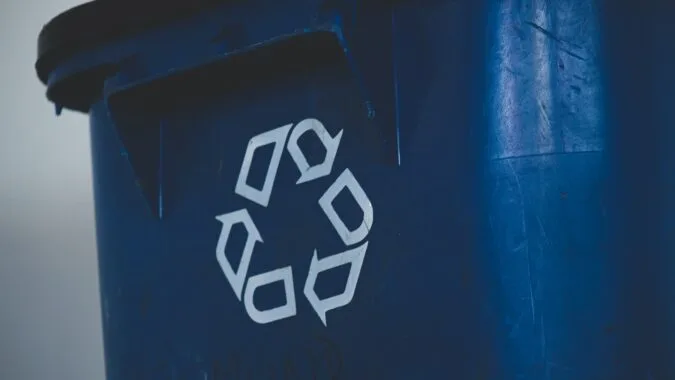 recycling logo on bin.