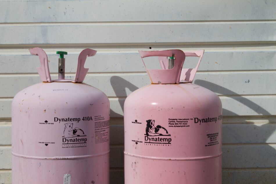 two pink gas bottles.