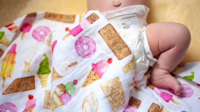 baby in colourful nappy.