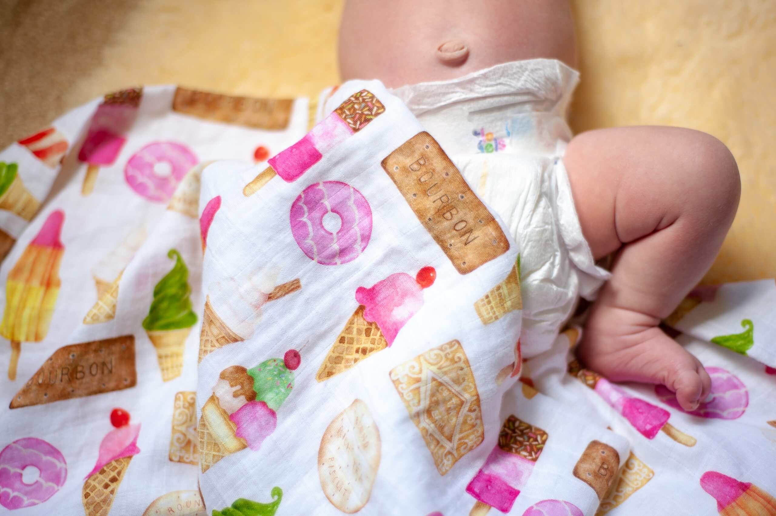 baby in colourful nappy.