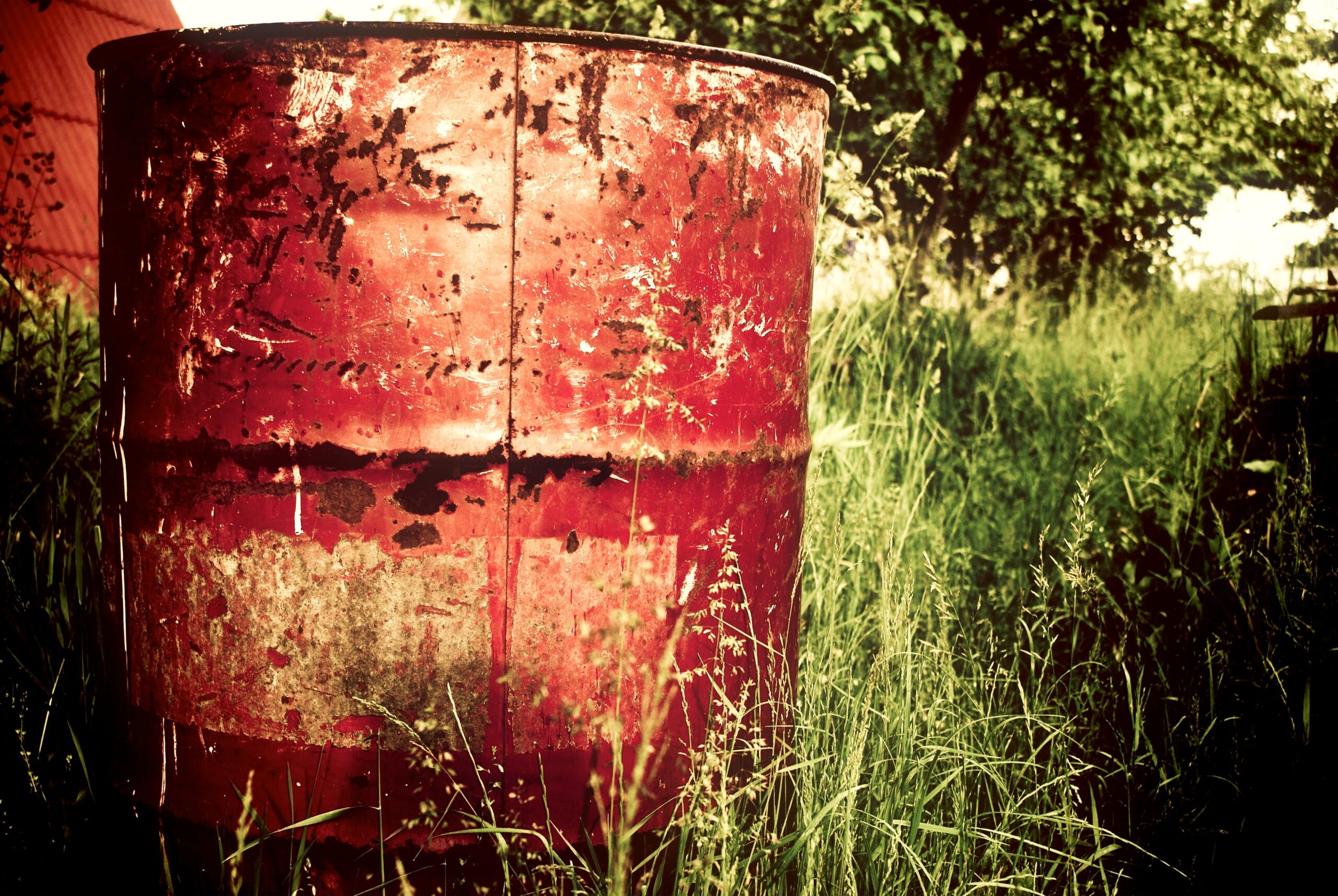 oil drum in grass.