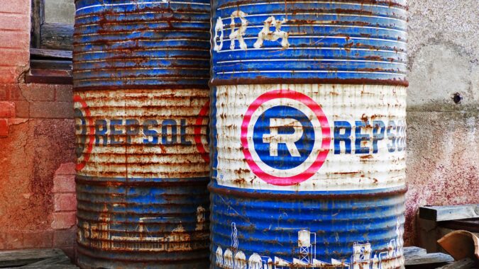 two oil drums on a pallet.