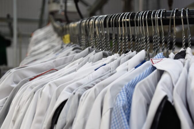 shirts hanging on rail.