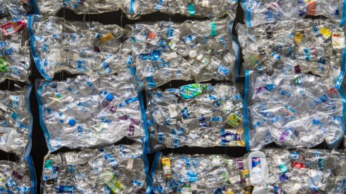 bags of separated plastic bottle waste.