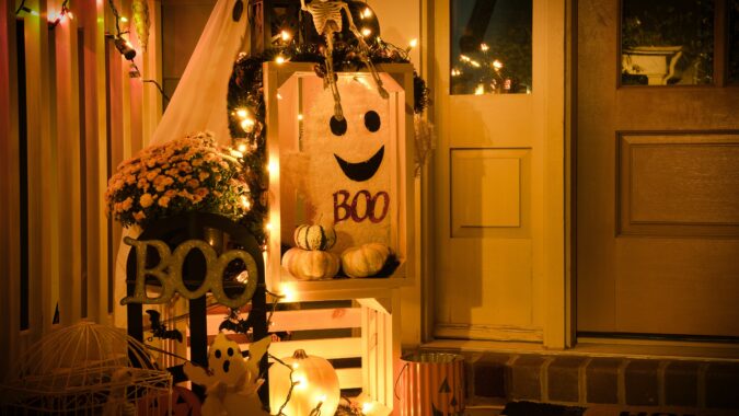 halloween lights and ghost decorations inside home.