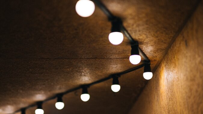 strip of LED bulbs along ceiling.