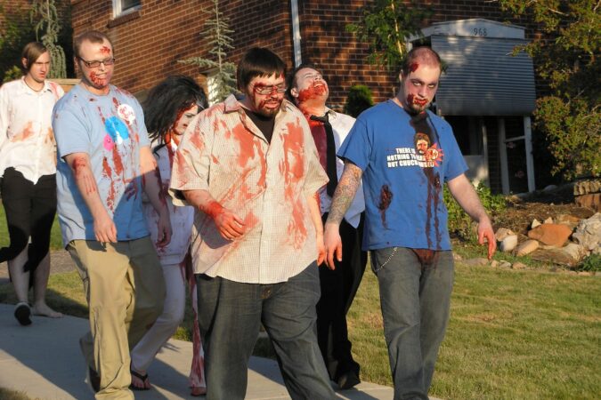 zombies walking down street.