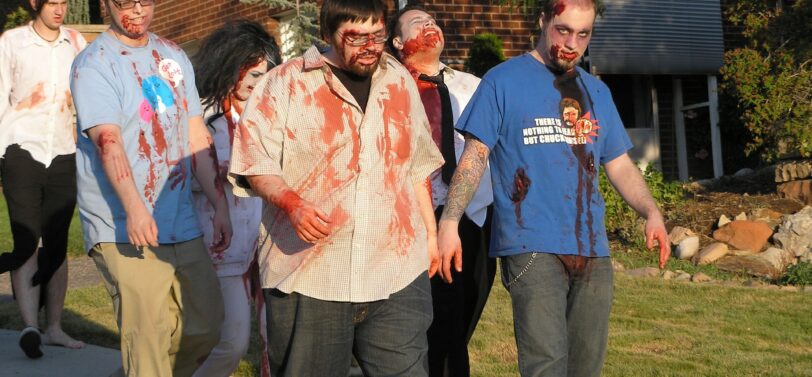 zombies walking down street.