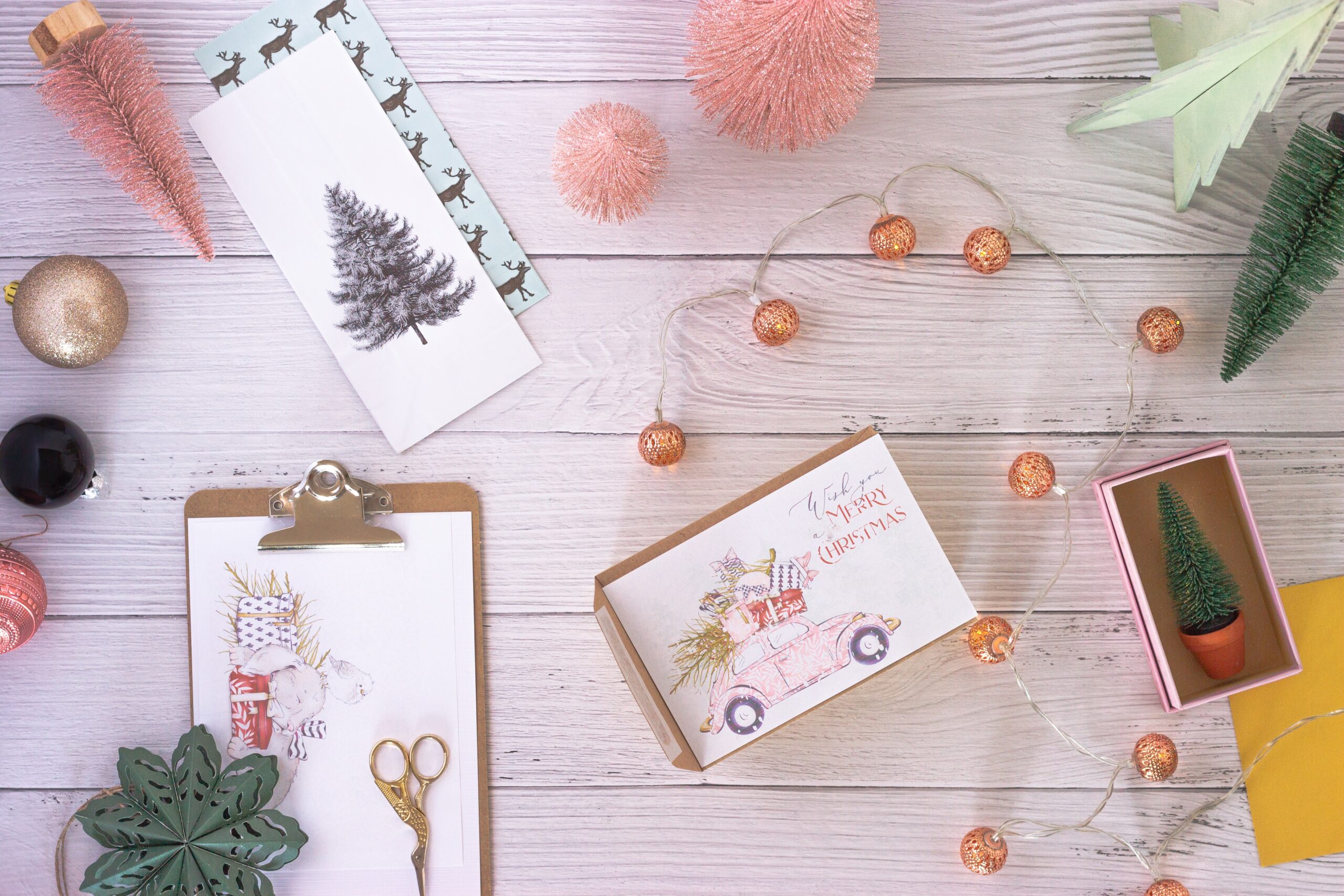 Christmas cards on wooden table.