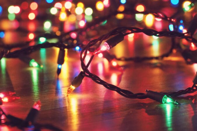 close up of Christmas light string on the floor.