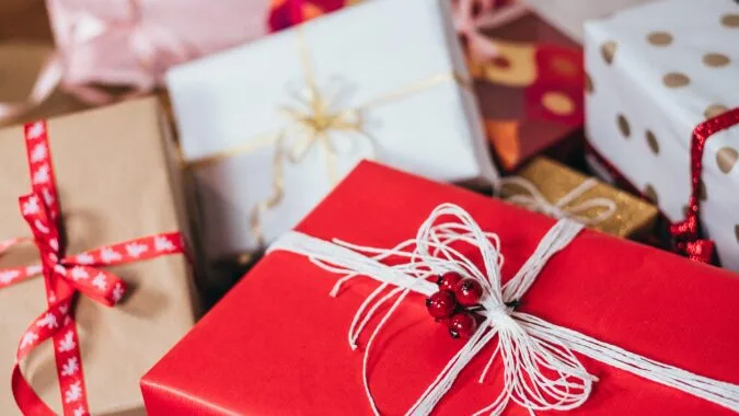Christmas presents wrapped up with bow.