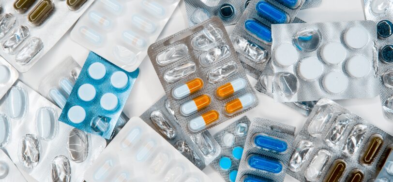 half empty packets of tablets and pills.