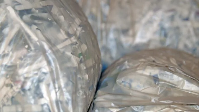 plastic bags full of shredded paper.