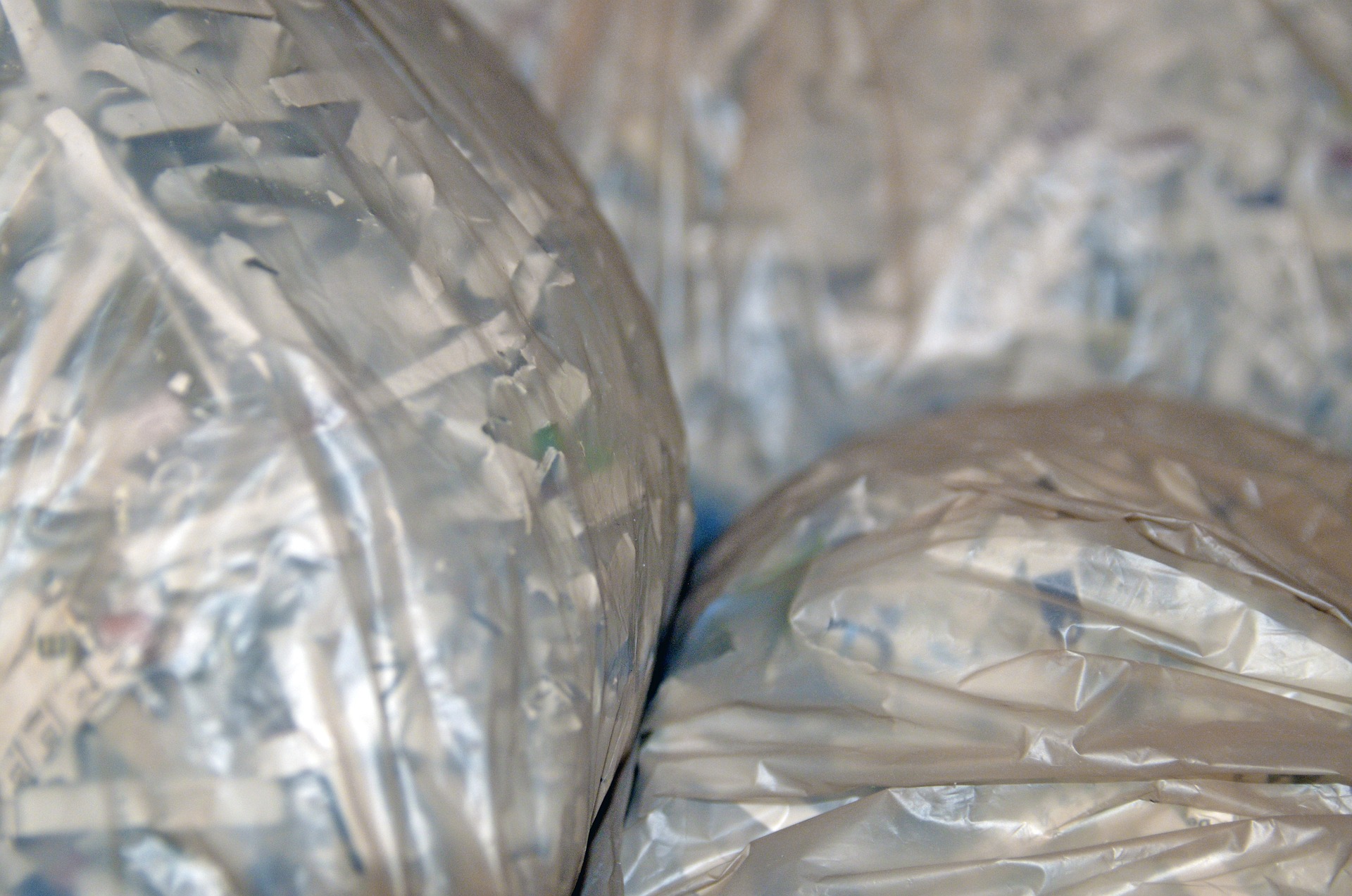 plastic bags full of shredded paper.