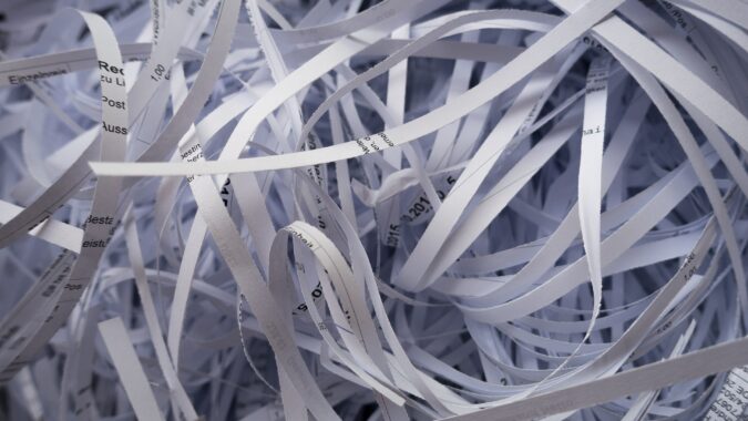 thin curled up strips of shredded paper.