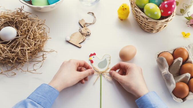 Easter crafting with eggs and chicken.