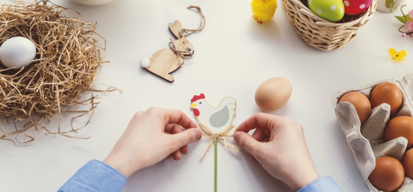Easter crafting with eggs and chicken.