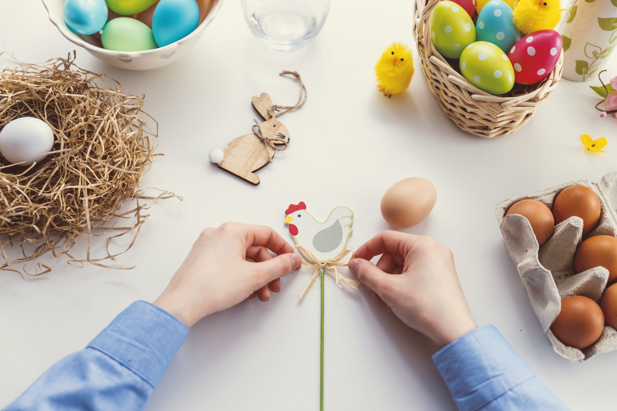 Easter crafting with eggs and chicken.
