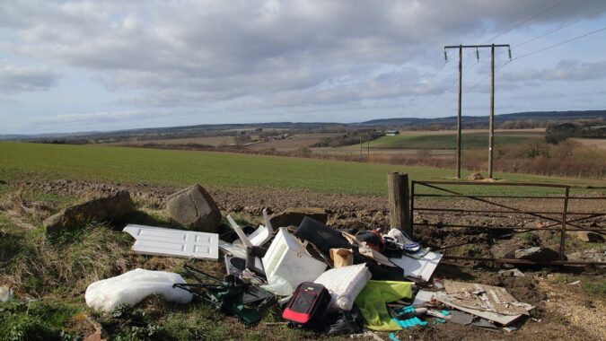 fly tipping on a field.