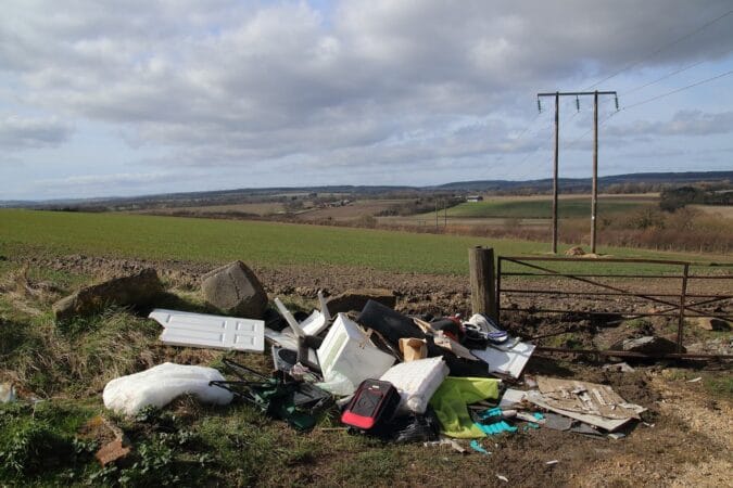 fly tipping on a field.
