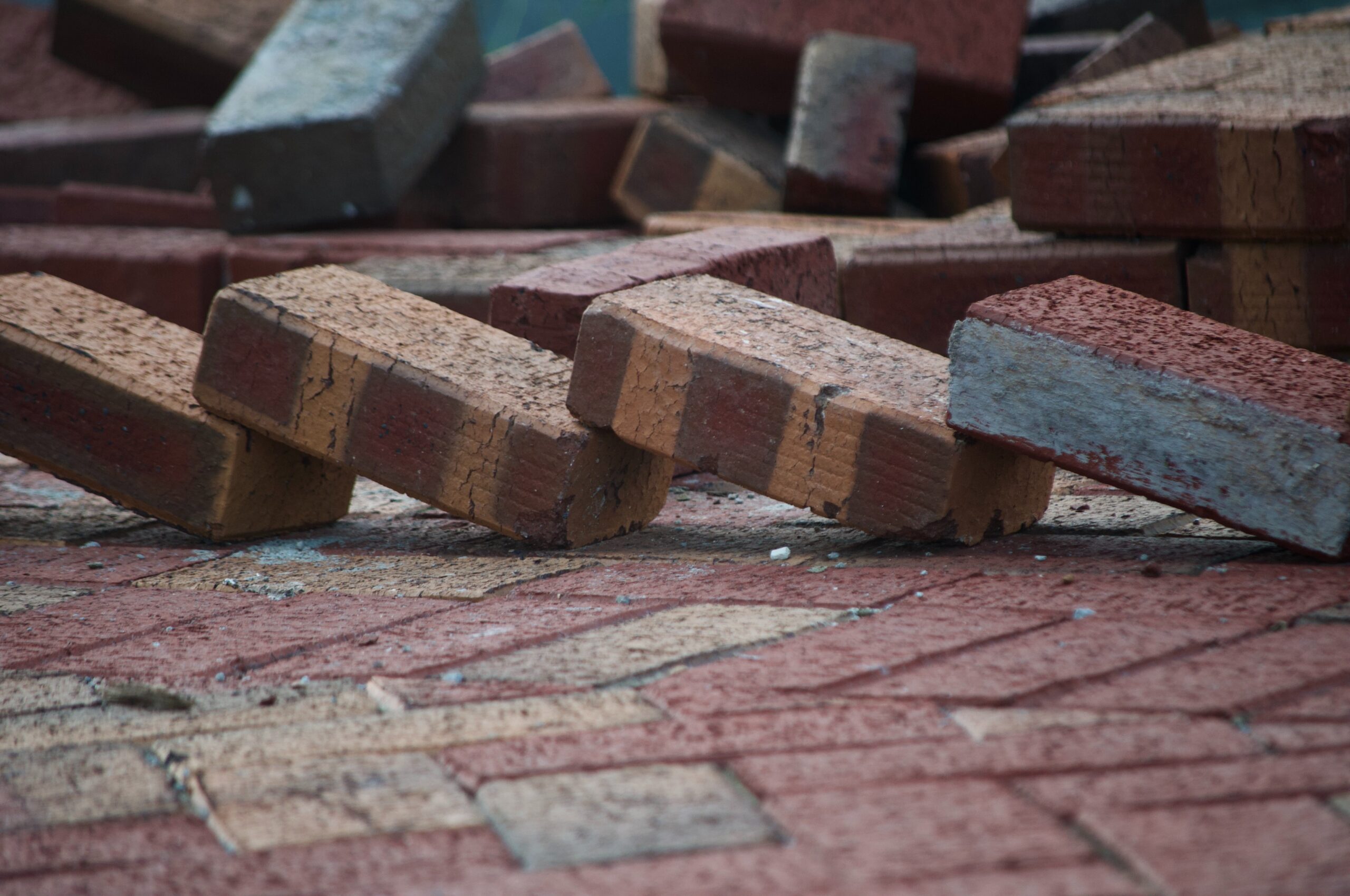 four bricks leaning on each other.
