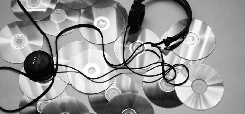 cds and headphones spread out on the floor.