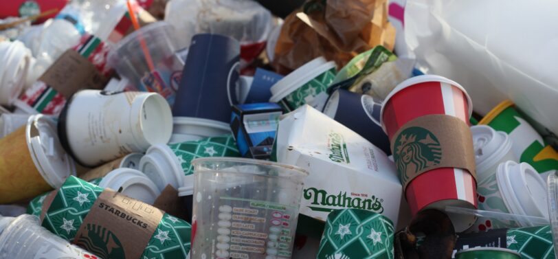 food and drinks packaging waste in a bin.