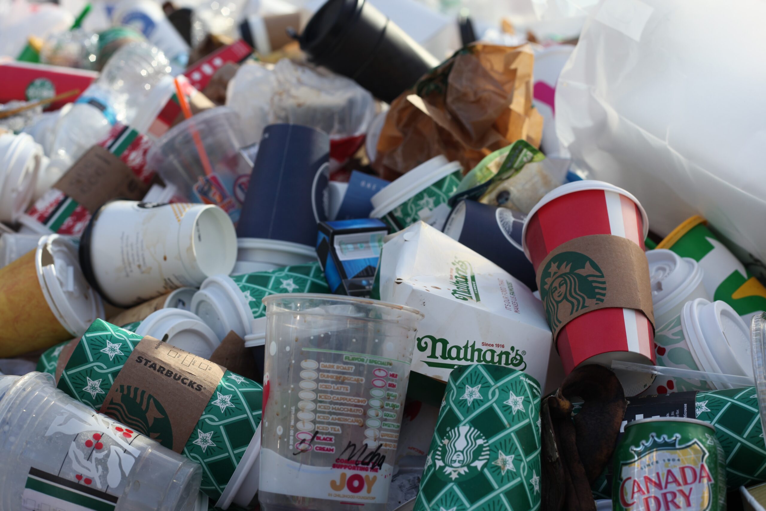 food and drinks packaging waste in a bin.