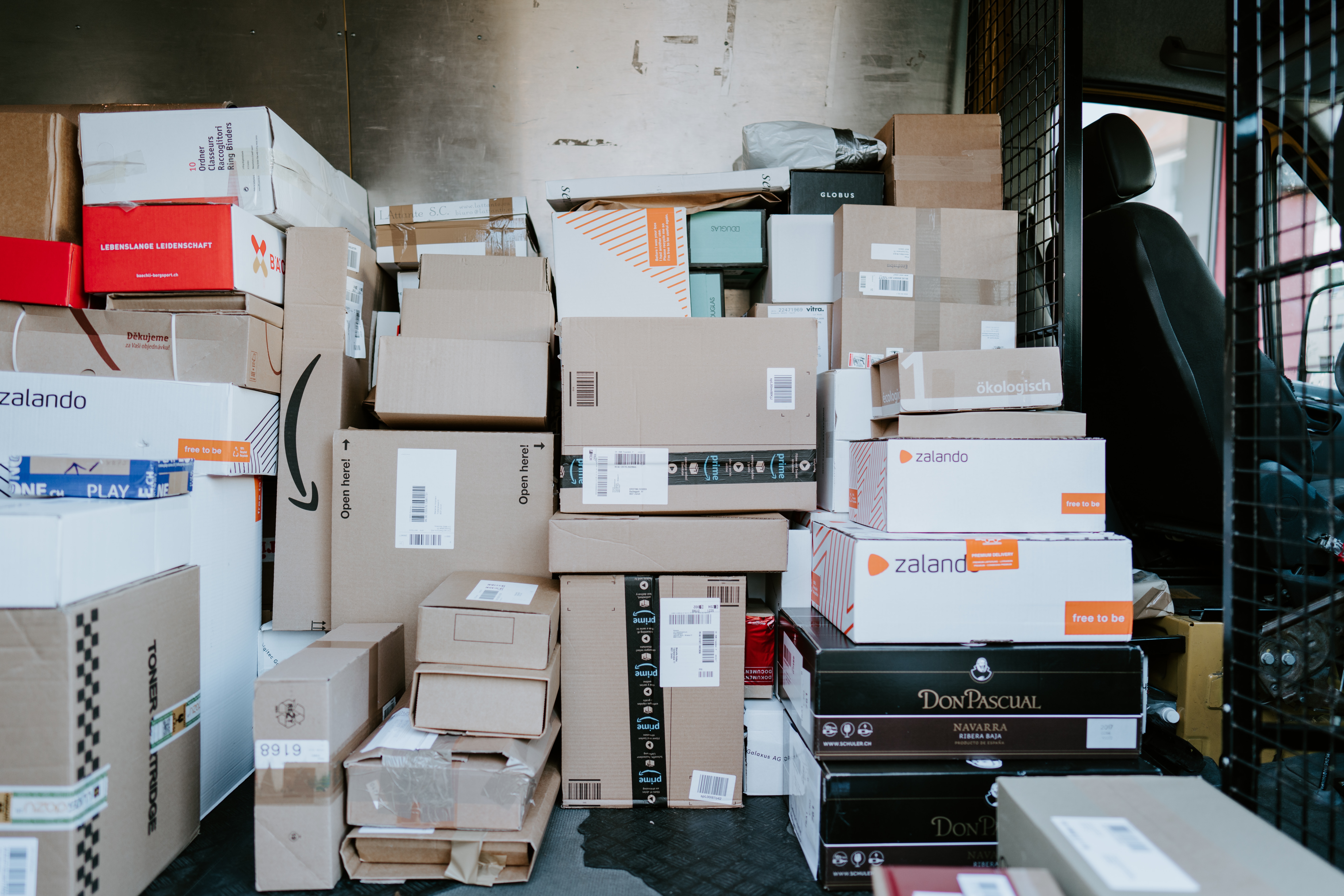 boxes piled up in a storeroom.