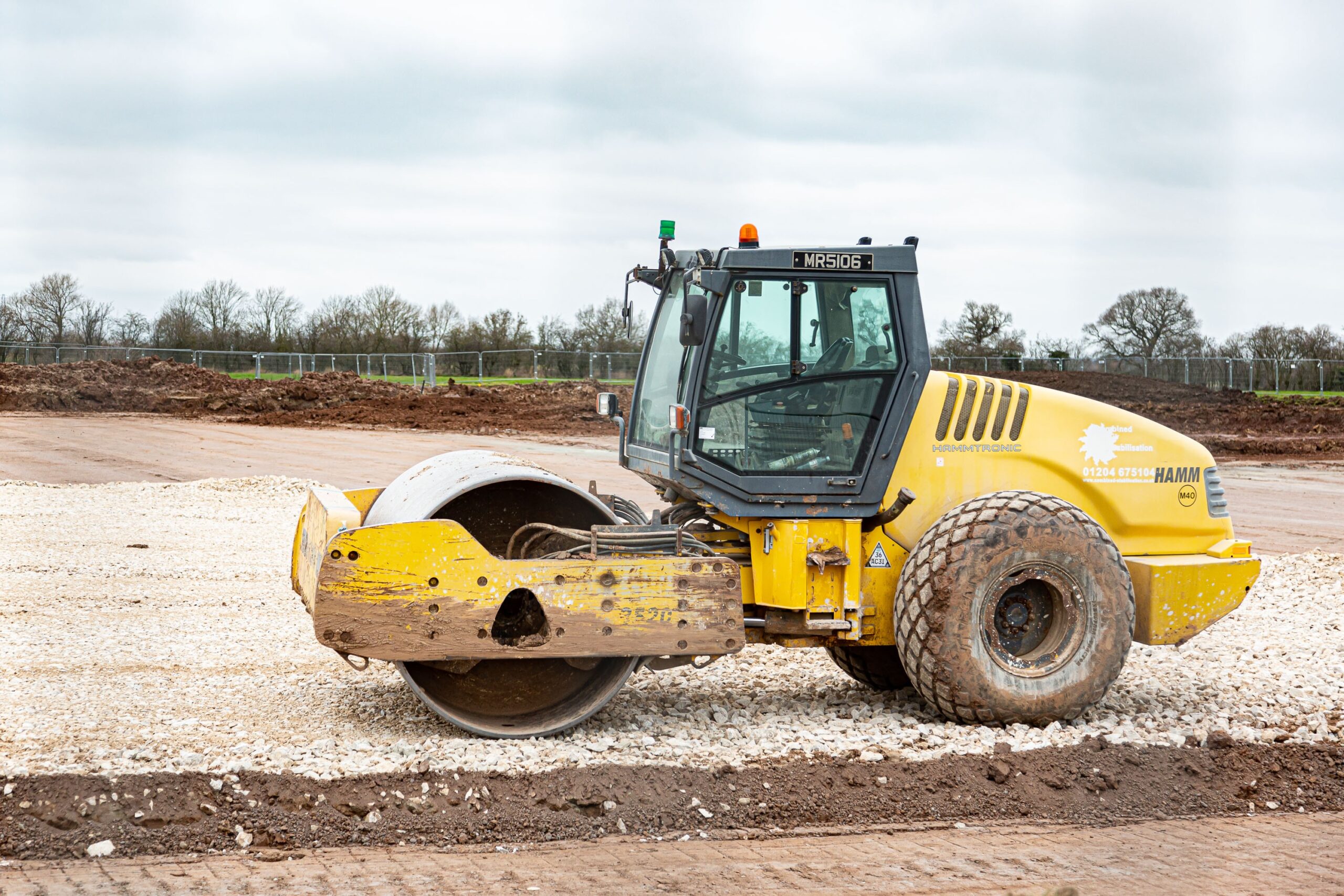 roller flattening the ground.