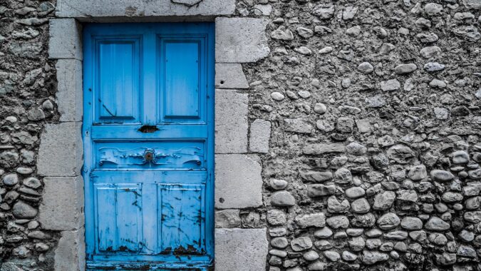 old wooden door in building.