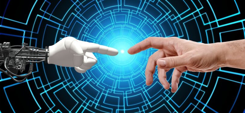 AI robot hand touching human hand.