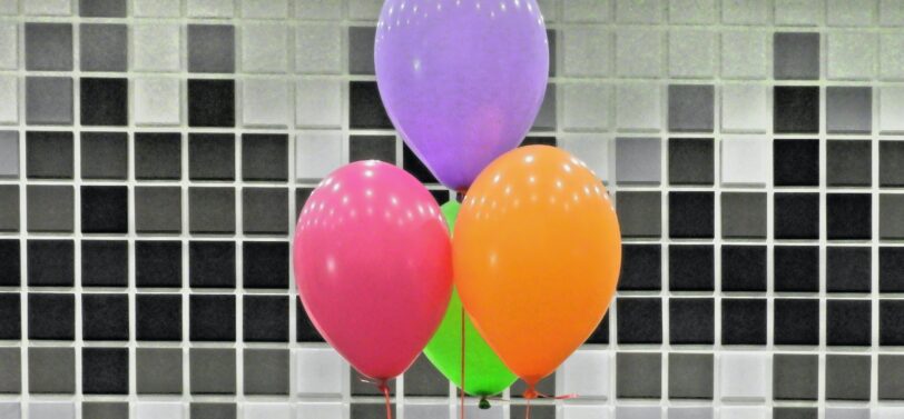 red, purple, and orange balloons.