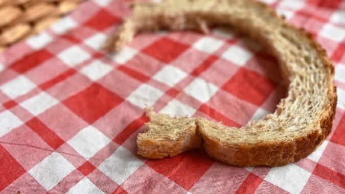 crust of bread on table waste food.