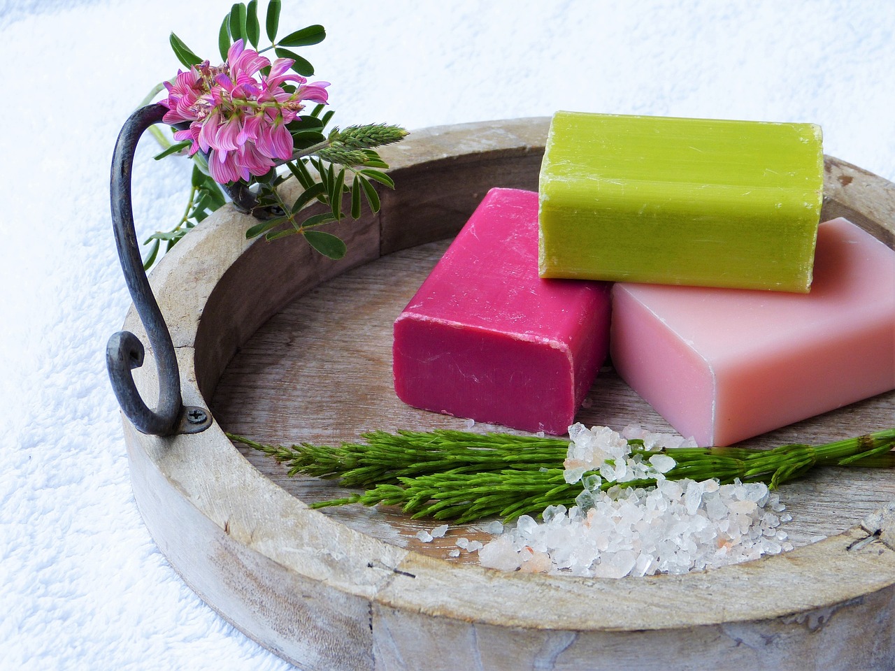 three bars of soap on a plate.