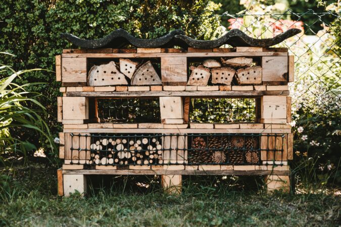 pallet converted into planter in a garden.