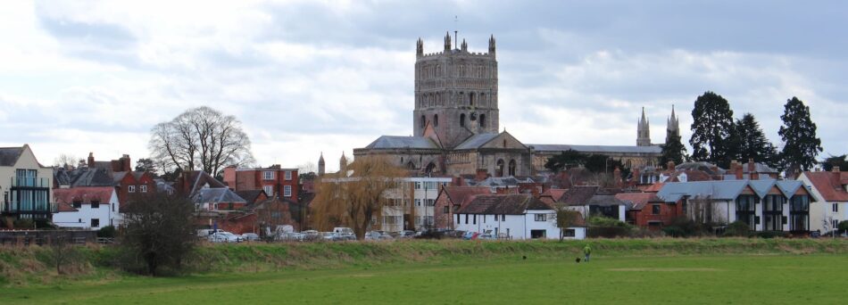 Tewkesbury Abbey and common in foreground.