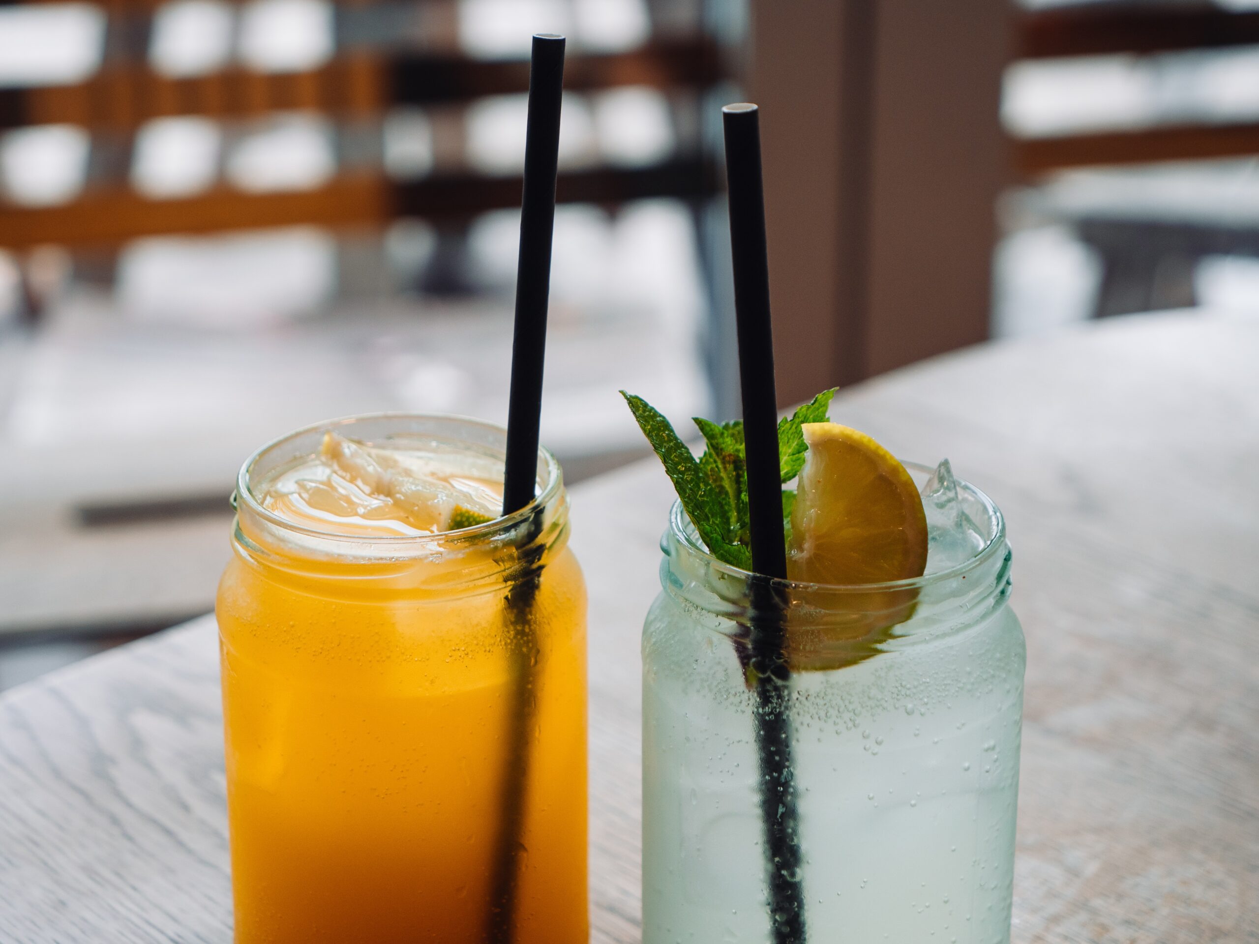 glass drinks jars with straws.